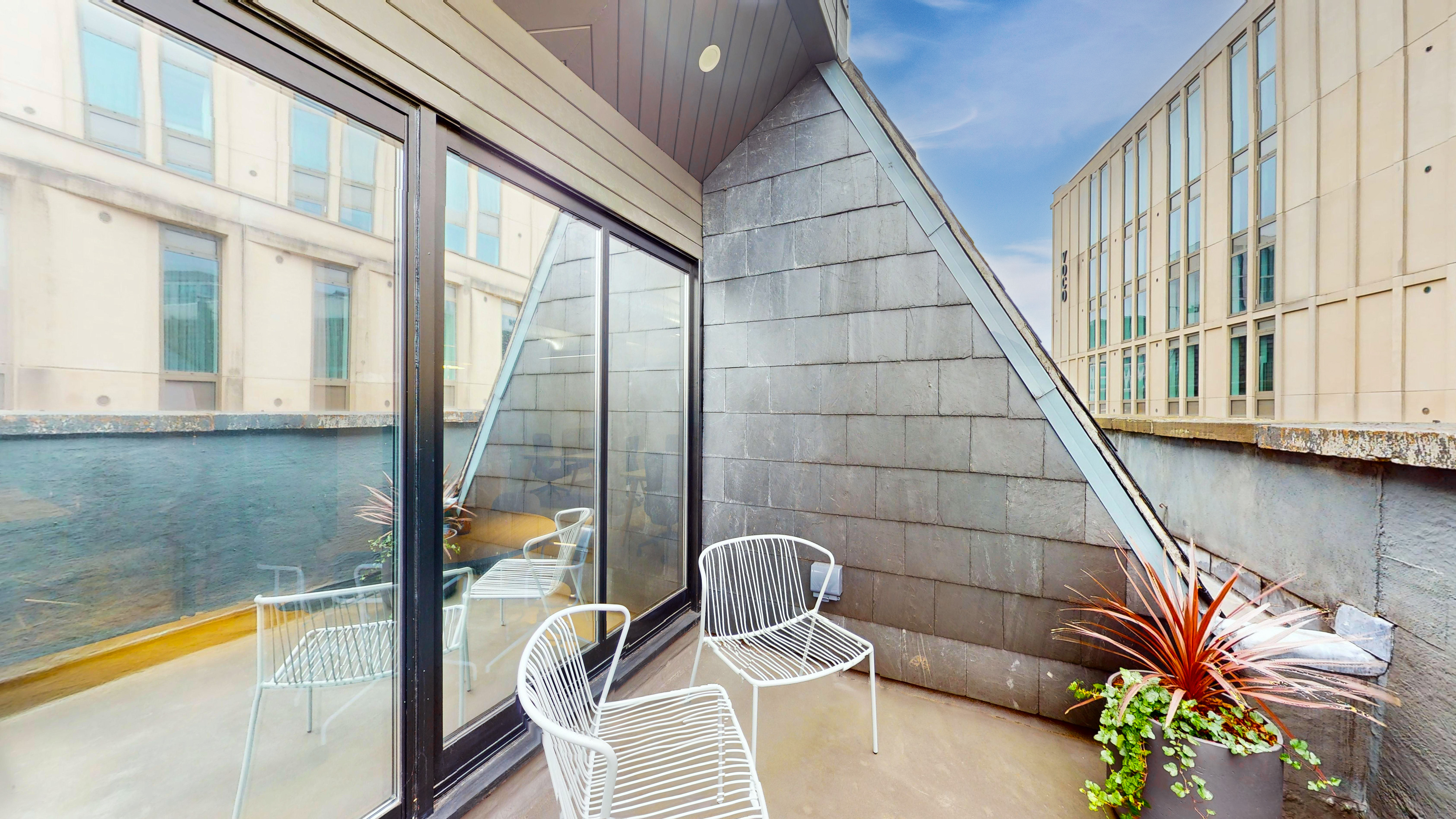 Private terrace seating and glass balustrade